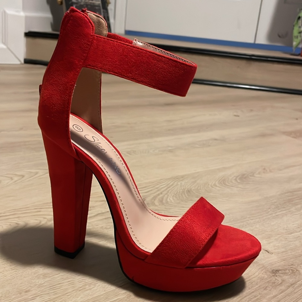 Red ankle strap heels.